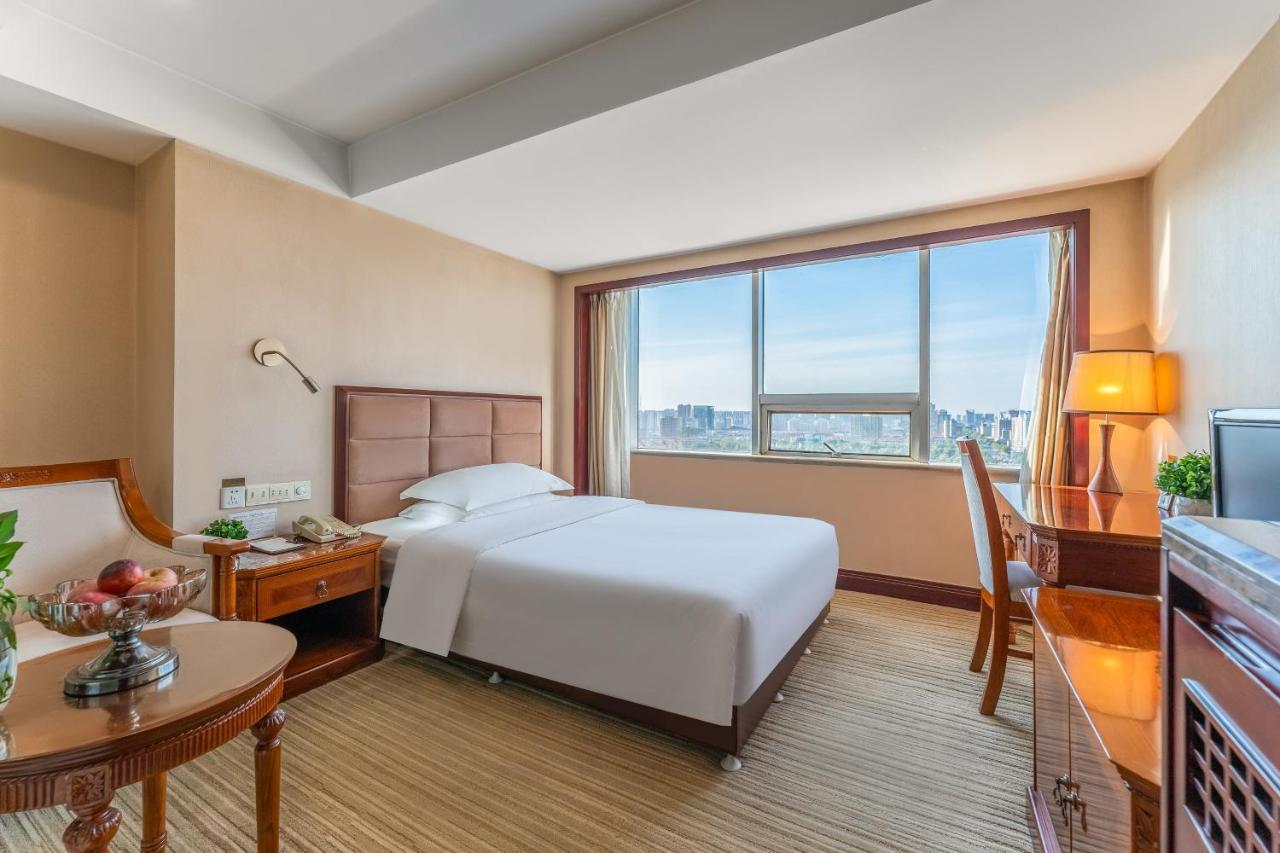 Baoding Zhong Yin Hotel Екстериор снимка